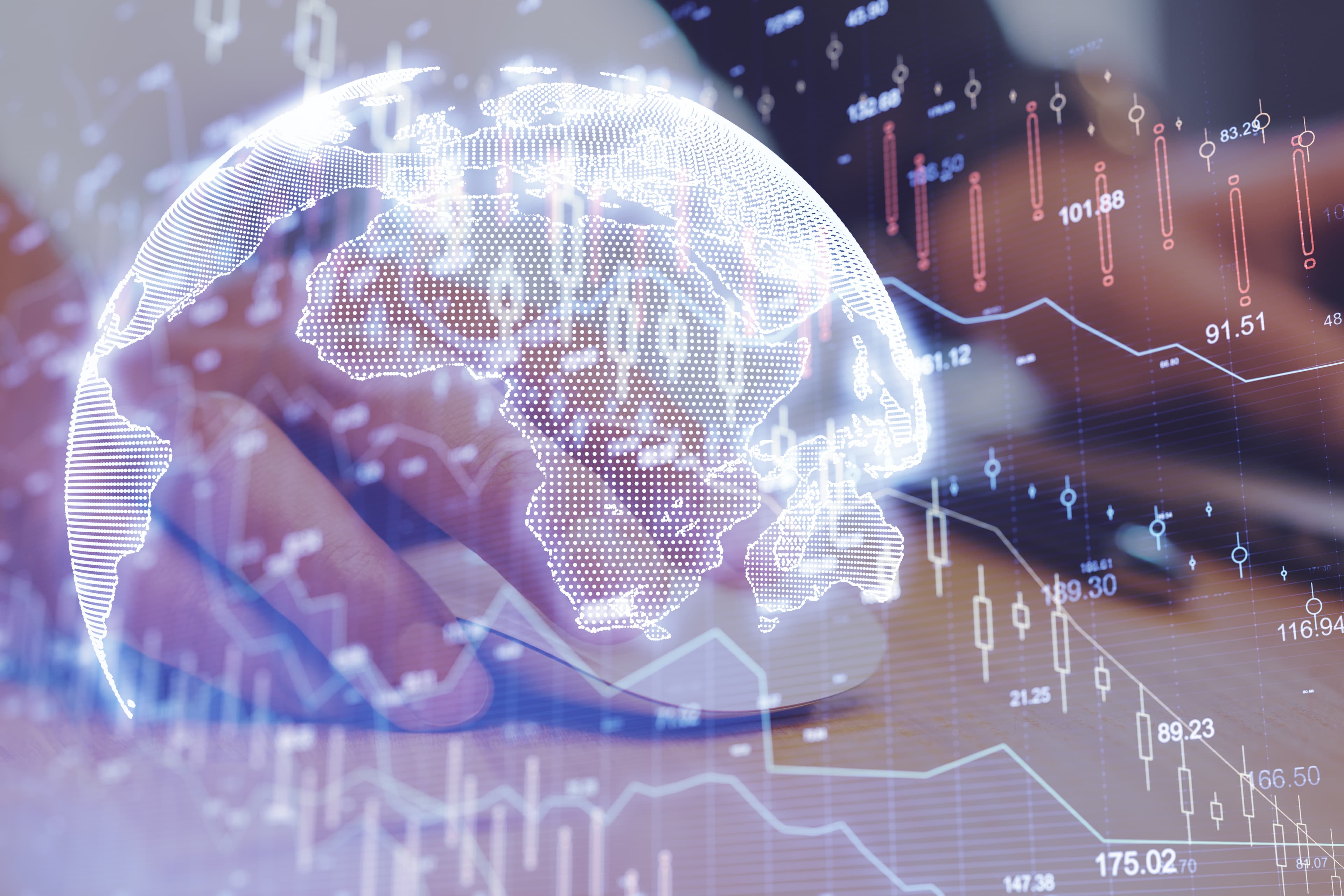A digital globe and financial market chart overlay — global finance in motion.